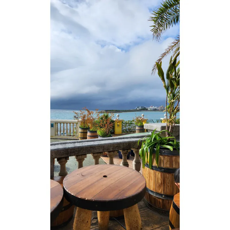 Oceanfront terrace with wooden tables in American Village Chatan Okinawa
