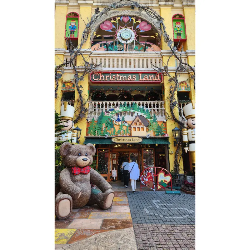 Christmas Land entrance with teddy bear and holiday decorations at American Village in Chatan, Okinawa