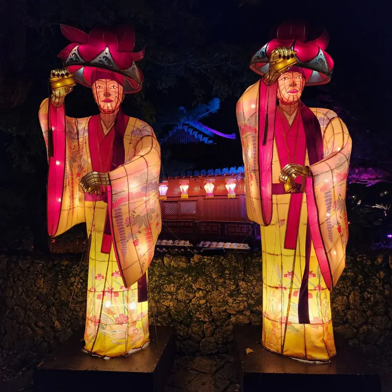 Illuminated lantern figures of Ryukyuan dancers at Murasaki Mura Lantern Festival
