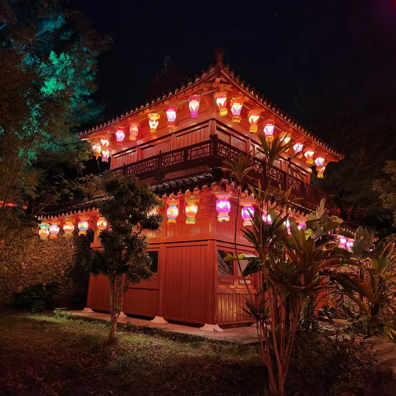 Traditional Ryukyuan pavilion decorated with lanterns at Murasaki Mura