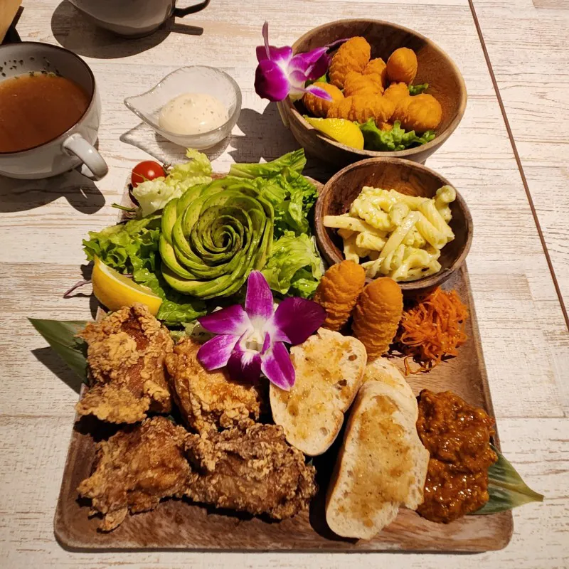 Hawaiian-style meal with fried chicken, salad, pasta, and bread at Kapuka Café in American Village, Chatan