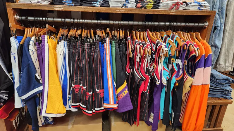 Rack of colorful basketball jerseys at a shop in American Village, Chatan, Okinawa