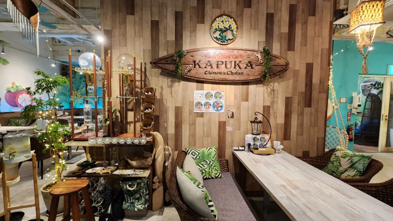 Surfboard sign of Hawaiian Café Kapuka in American Village, Chatan, Okinawa