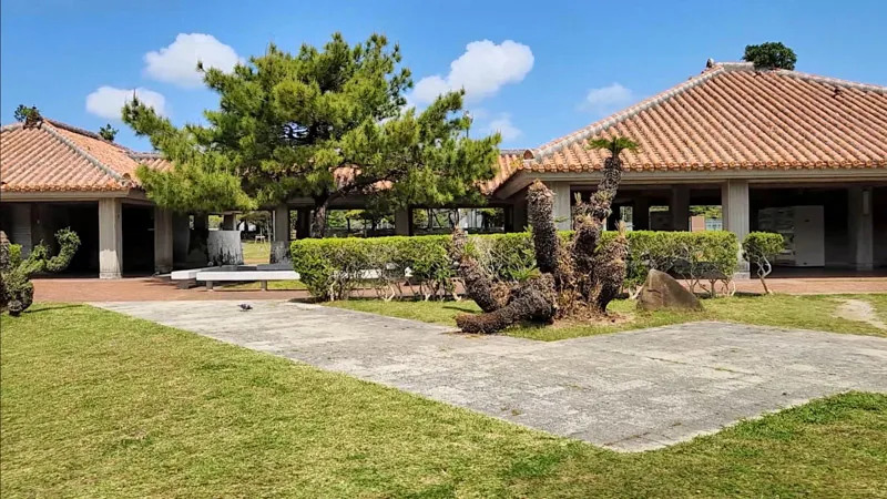Building with traditional red roofs at Kitanakagusuku Sports Park Okinawa