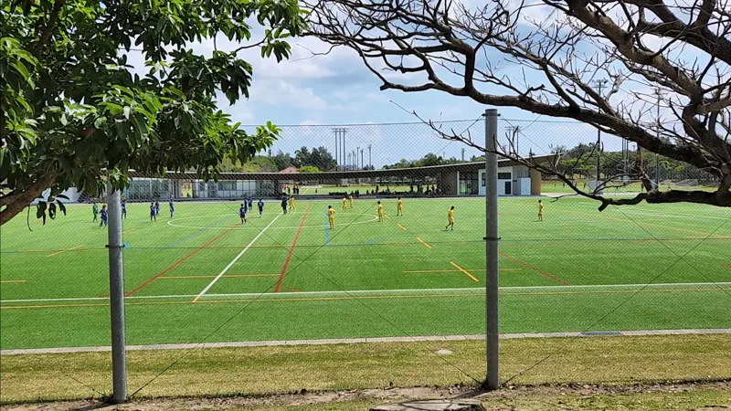 Soccer match on synthetic turf at Kitanakagusuku Sports Park Okinawa
