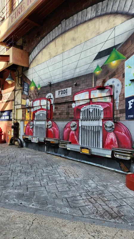 Red vintage fire truck wall decoration at American Village Okinawa