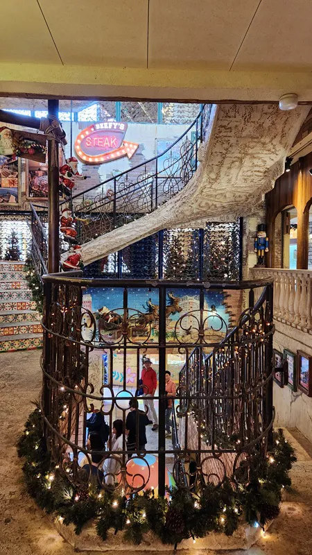 Indoor staircase with lights and decorations in Okinawa
