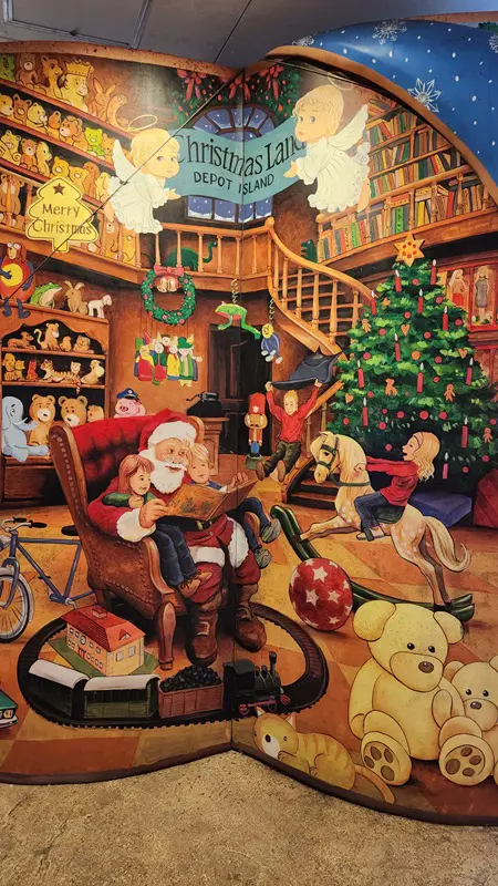 Christmas wall mural with Santa Claus and children at Christmas Land Okinawa