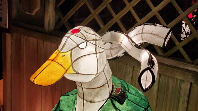 Close up of a Afira Majimum duck shaped yokai lantern with horns and red jewel detail