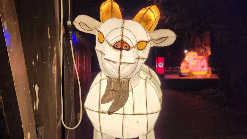 Illuminated Kata Ashi Pinza goat yokai lantern with golden horns at the Ryukyu Yokai Festival in Okinawa