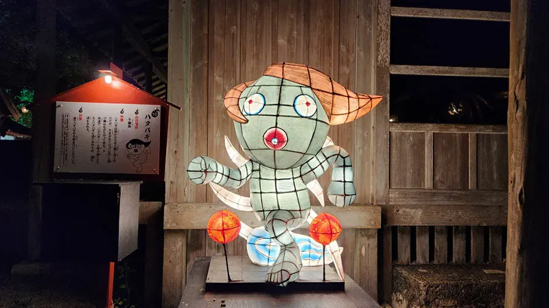Lantern of sea Hatapagi yokai with green body and orange hair at the Ryukyu Yokai Festival