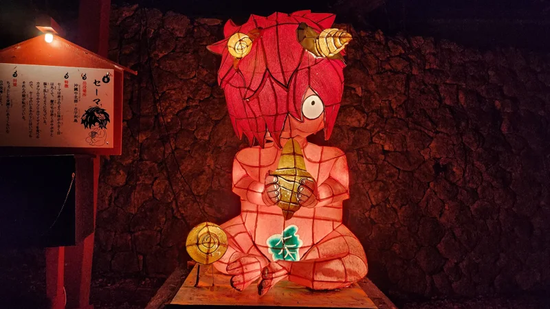Red haired Sema yokai lantern holding seashells at the Ryukyu Yokai Festival