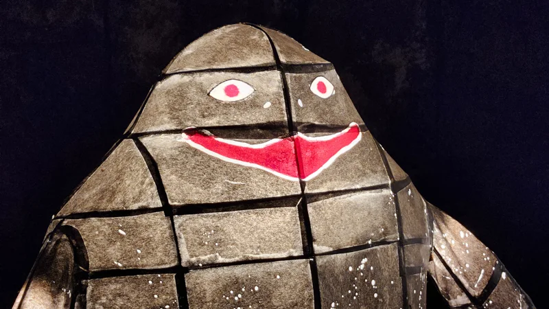 Mud Hadakanuyu yokai lantern with red smile and glowing eyes at the Ryukyu Yokai Festival