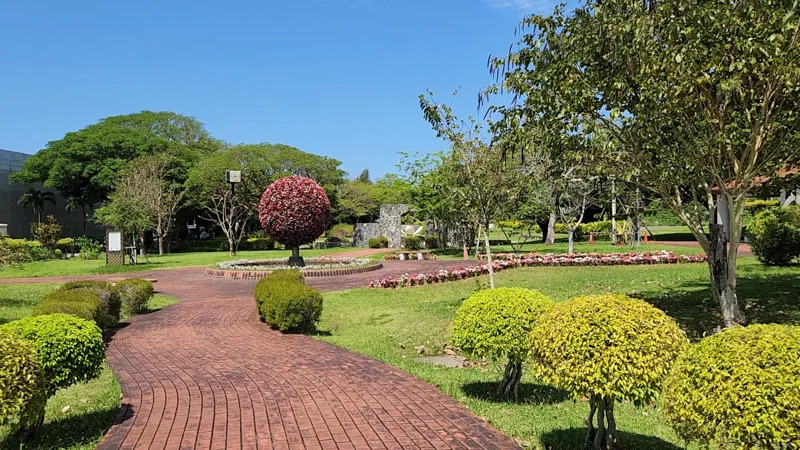 Red brick path through Ocean Expo Park garden