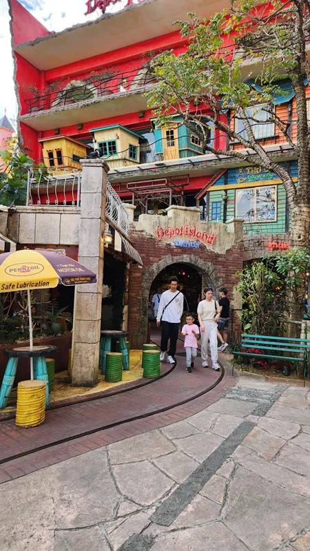Visitors walking near the Depot Island entrance at American Village Okinawa