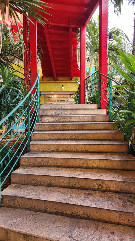 Outdoor staircase surrounded by tropical plants in Okinawa