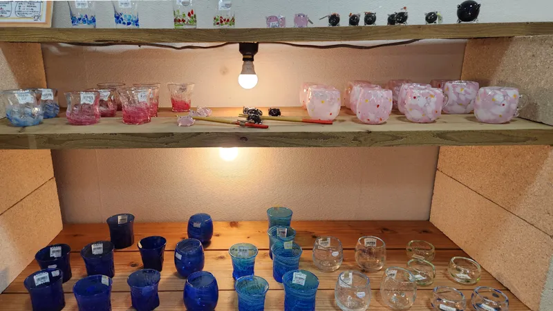 Colorful Ryukyu glass cups on display at a shop in Okinawa