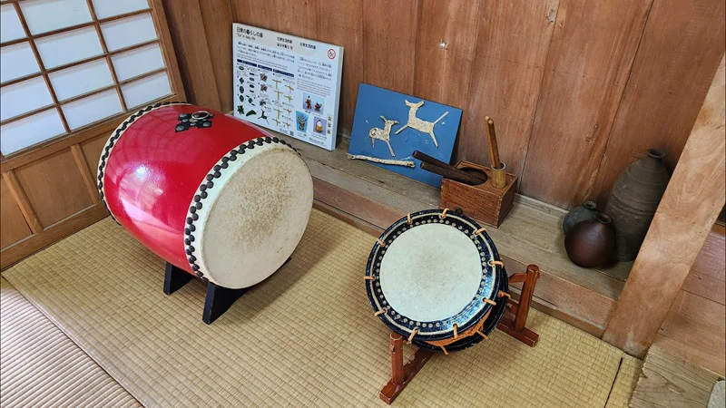 Traditional Okinawan taiko drums displayed inside the Jitūdē’s house in Okinawa, Japan.