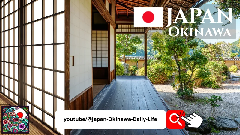 Traditional Japanese wooden house with shoji doors opening onto a garden in Okinawa, Japan.