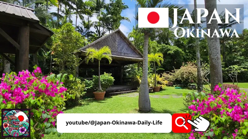Tropical wooden pavilion among palm trees and colorful flowers at Southeast Botanical Gardens in Okinawa, Japan, with Japan Okinawa logo.