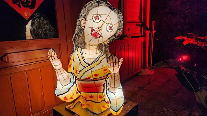 Illuminated lantern figure of a woman (Hanamo) in kimono at Okinawan festival