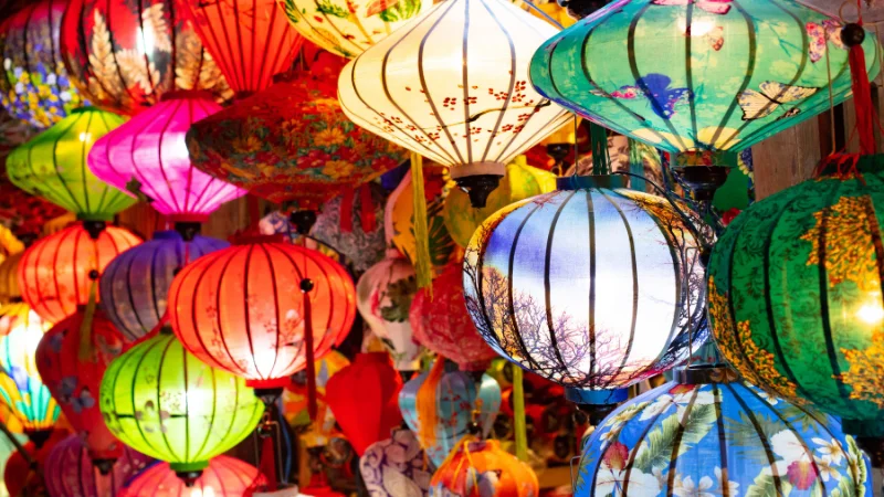 Vibrant paper lanterns in different colors and patterns at Okinawan festival