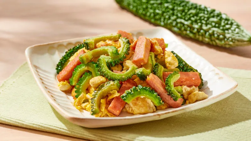 Plate of goya champuru with bitter melon, egg, tofu, and luncheon meat