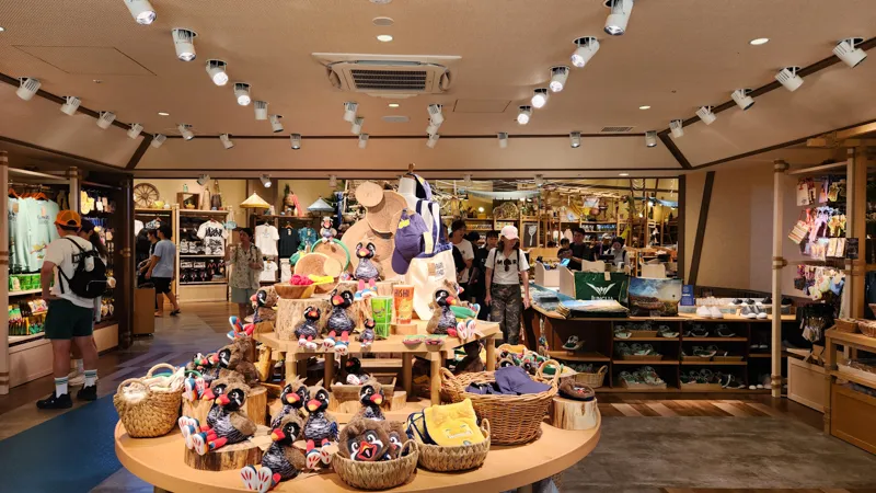 Inside the Junglia gift shop with plush toys, souvenirs, and themed merchandise