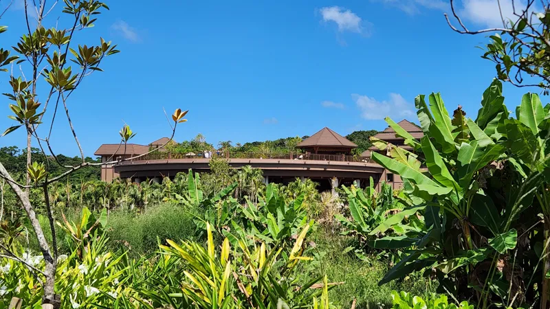 Finding Dinosaurs attraction sign with giant dinosaur egg props at Junglia Okinawa