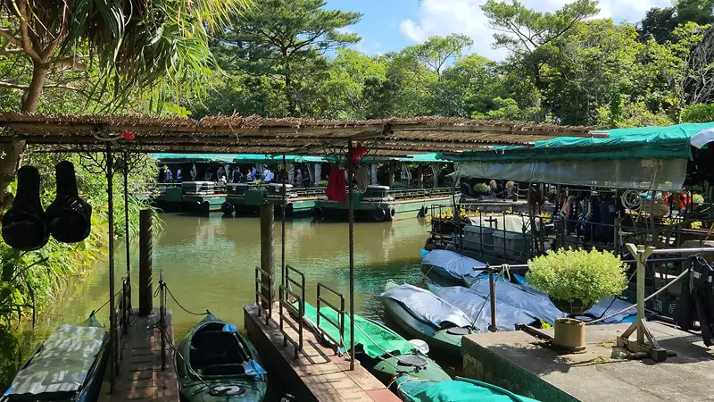 River boats docked at Bios no Oka Park in Okinawa