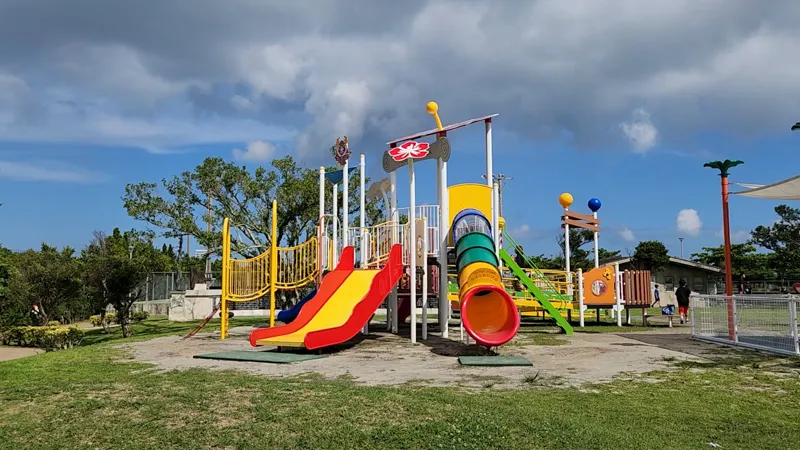 Colorful children’s playground with slides at Yoshinoura Park in Okinawa