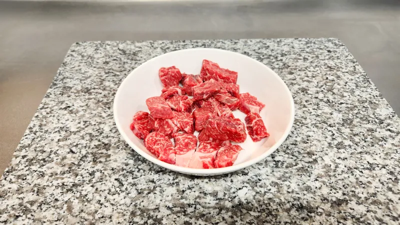 Fresh raw beef pieces prepared for Japanese beef soup
