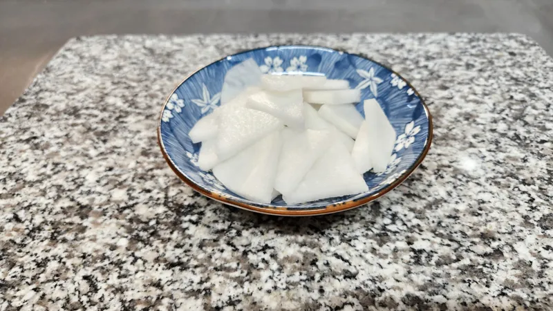 Sliced daikon radish prepared for Japanese beef soup
