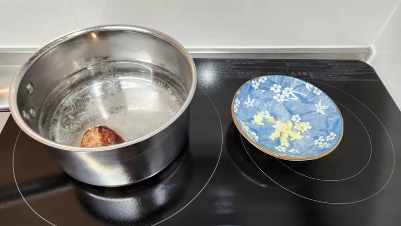 Peeled garlic clove placed on a small plate