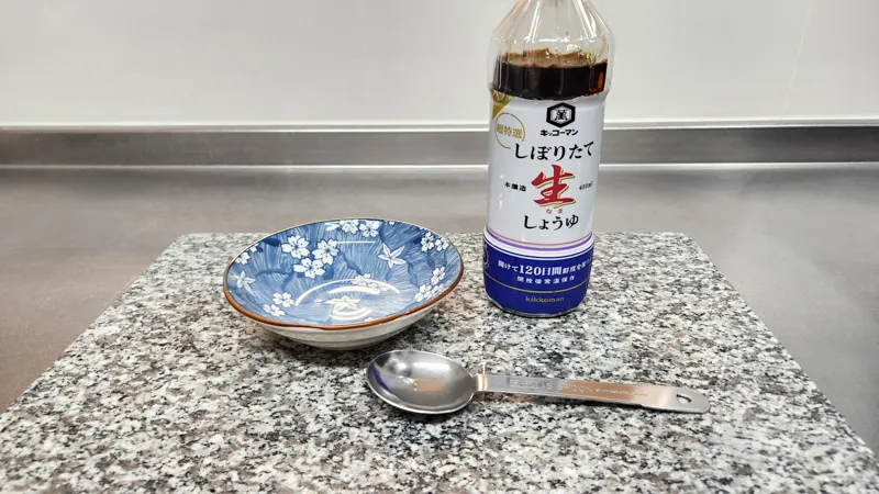 Japanese soy sauce bottle with spoon and small dish